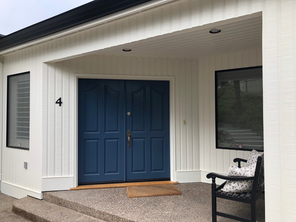 Navy Door on White Exterior